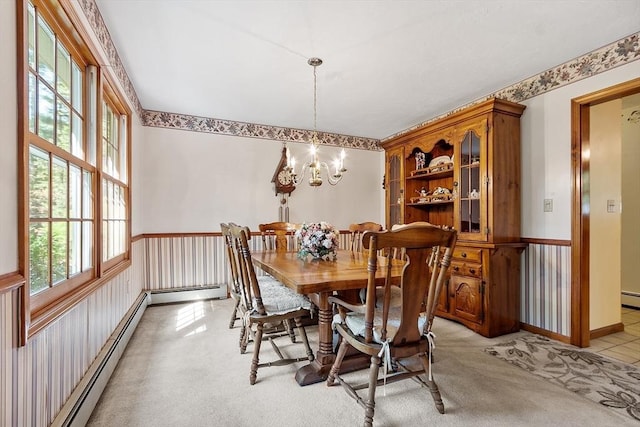 4 Clarke Rd, Littleton, MA 01460 - dining space featuring a baseboard radiator, a chandelier, and light carpet