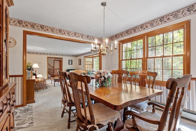 4 Clarke Rd, Littleton, MA 01460 - dining space featuring stairs, light colored carpet, and a chandelier