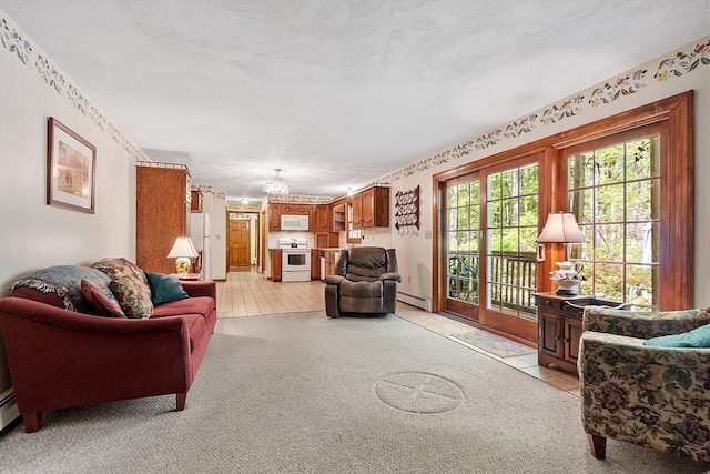 4 Clarke Rd, Littleton, MA 01460 - living area featuring a chandelier, baseboard heating, light colored carpet, and light tile patterned floors