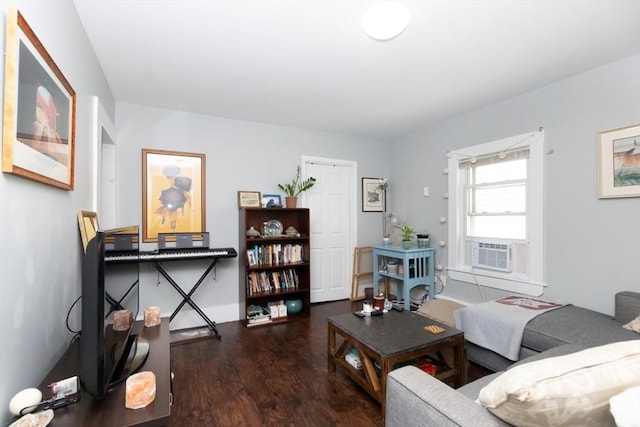 living room featuring dark hardwood / wood-style floors and cooling unit