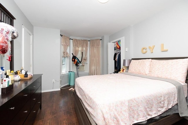 bedroom with a closet and dark wood-type flooring