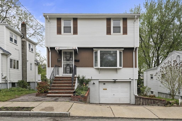 44 Clematis Rd, Medford, MA 02155 - view of front of property featuring a garage