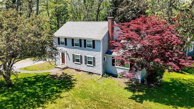146 Elm St, Andover, MA 01810 - view of front of property with a chimney, a front yard, and a shingled roof