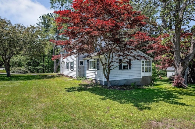 146 Elm St, Andover, MA 01810 - view of side of property with a yard