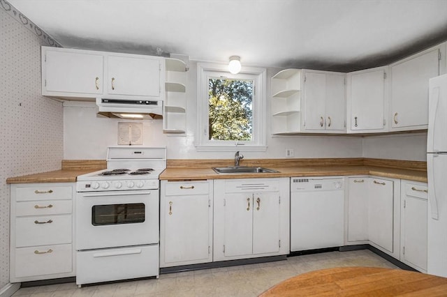 146 Elm St, Andover, MA 01810 - kitchen featuring white appliances, a sink, open shelves, under cabinet range hood, and wallpapered walls