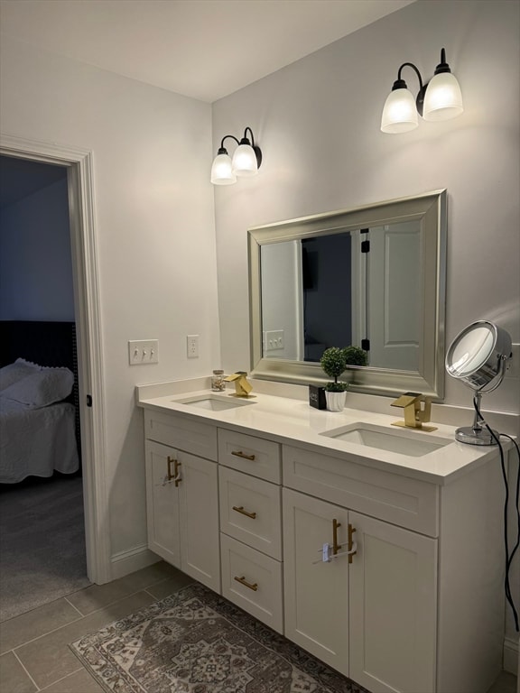 bathroom with vanity and tile patterned floors