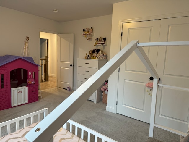 bedroom with light carpet