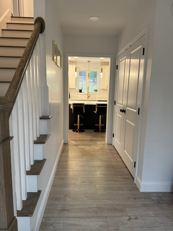 hall featuring light wood-type flooring