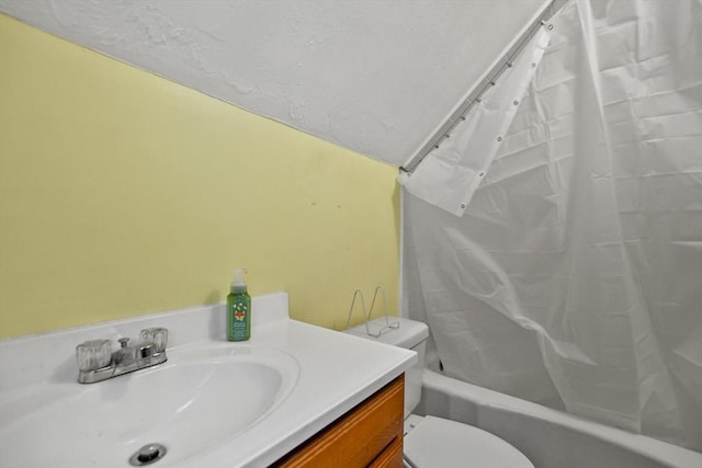 full bathroom featuring vanity, toilet, and shower / bathtub combination with curtain