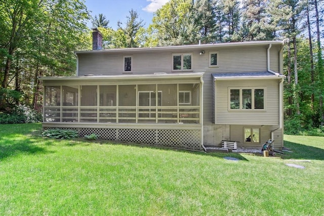 187 Middle Rd, Southborough, MA 01772 - rear view of house featuring a chimney, a sunroom, and a yard