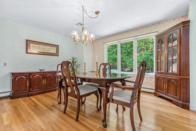 187 Middle Rd, Southborough, MA 01772 - dining area featuring wallpapered walls, a chandelier, light wood finished floors, and a baseboard radiator