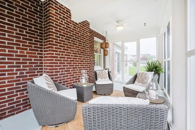 sunroom with beamed ceiling