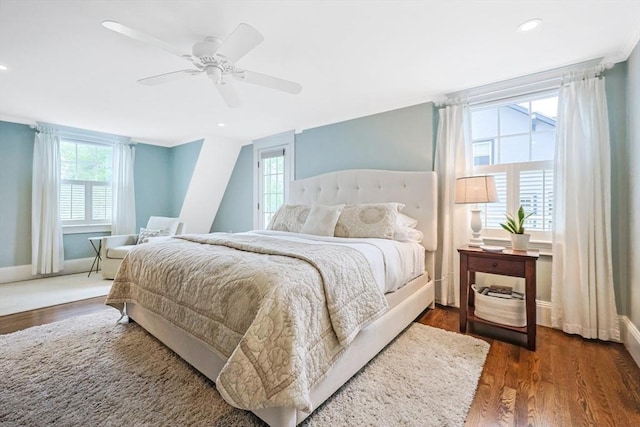bedroom featuring baseboards, wood finished floors, recessed lighting, and a ceiling fan