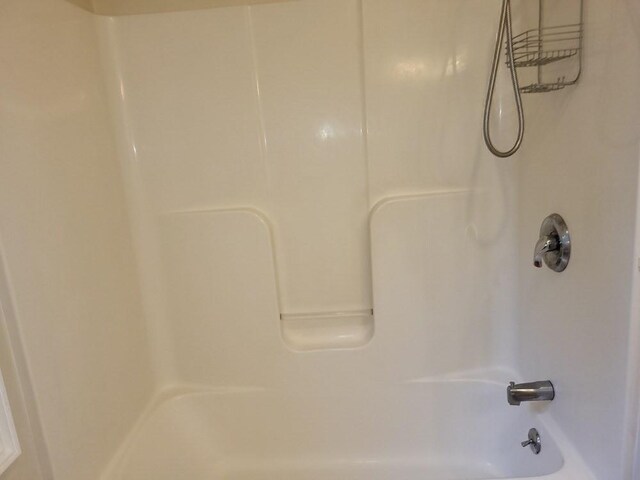 bathroom featuring bathing tub / shower combination