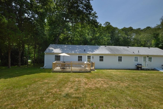 64 Charlotte White Rd Unit 2, Westport, MA 02790 - rear view of property featuring a wooden deck and a yard