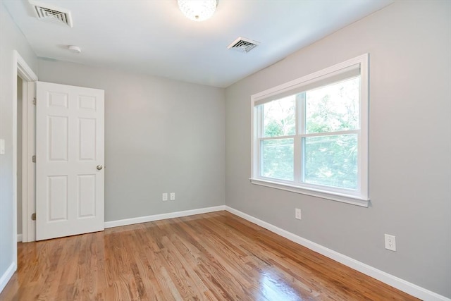 empty room featuring light hardwood / wood-style floors