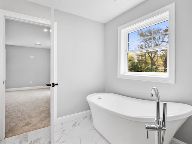 bathroom featuring a tub