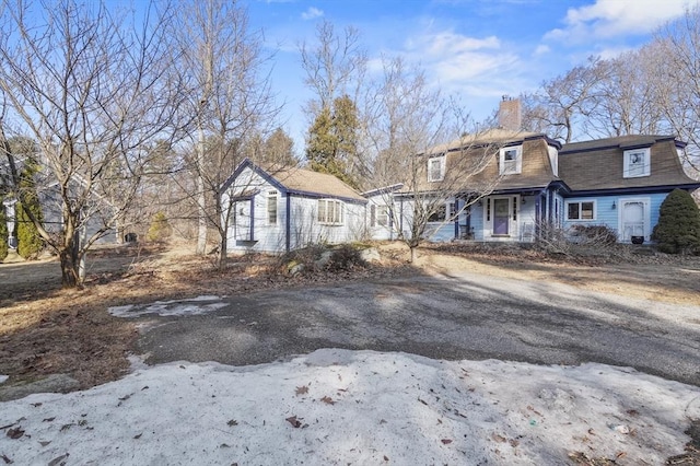 view of front of home with a chimney