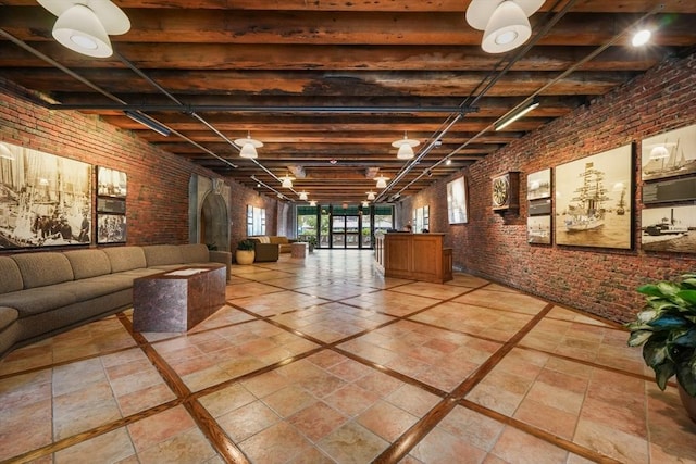 community lobby featuring brick wall