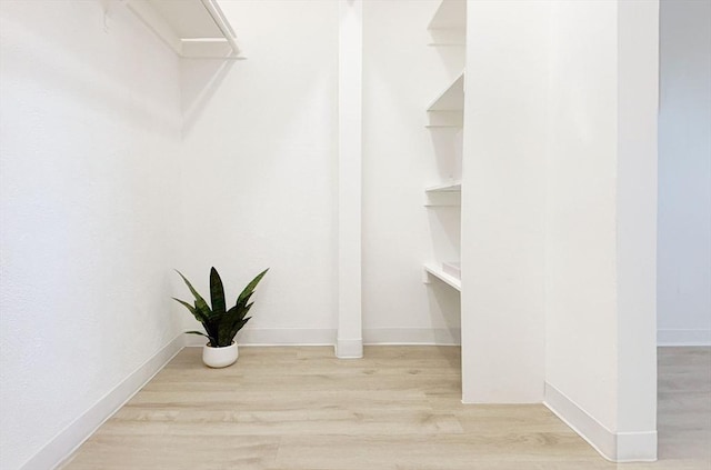 585 Revere Beach Pkwy Unit 410, Revere, MA 02151 - spacious closet featuring wood finished floors