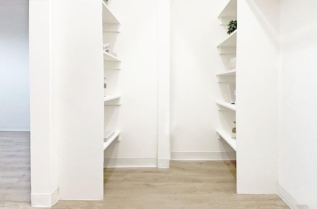 585 Revere Beach Pkwy Unit 410, Revere, MA 02151 - spacious closet with wood finished floors