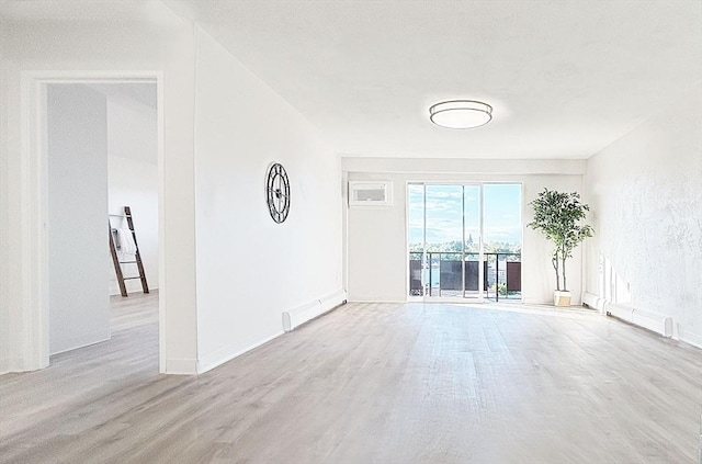585 Revere Beach Pkwy Unit 410, Revere, MA 02151 - spare room with wood finished floors and baseboards