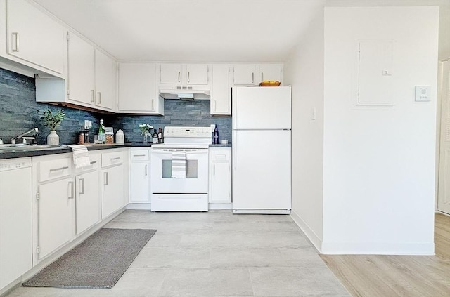 585 Revere Beach Pkwy Unit 410, Revere, MA 02151 - kitchen with white appliances, under cabinet range hood, tasteful backsplash, and a sink
