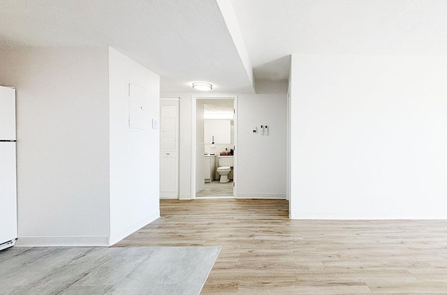 585 Revere Beach Pkwy Unit 410, Revere, MA 02151 - hall with light wood-style floors and baseboards