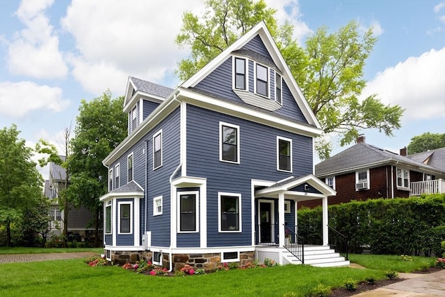 24 Ivory St, Boston, MA 02132 - american foursquare style home featuring a front yard