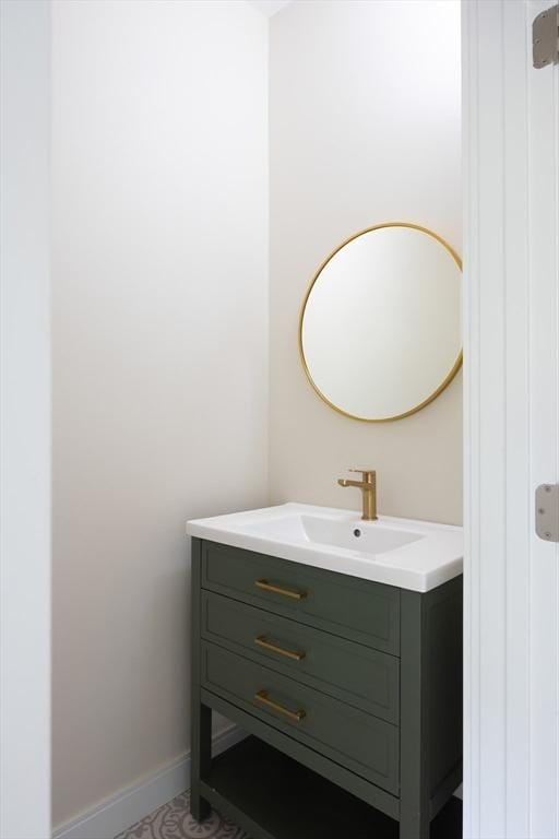 24 Ivory St, Boston, MA 02132 - bathroom with vanity and baseboards