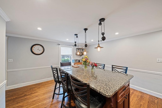 57 Century Rd, Weymouth, MA 02190 - dining space featuring light wood-style flooring, baseboards, ornamental molding, and recessed lighting