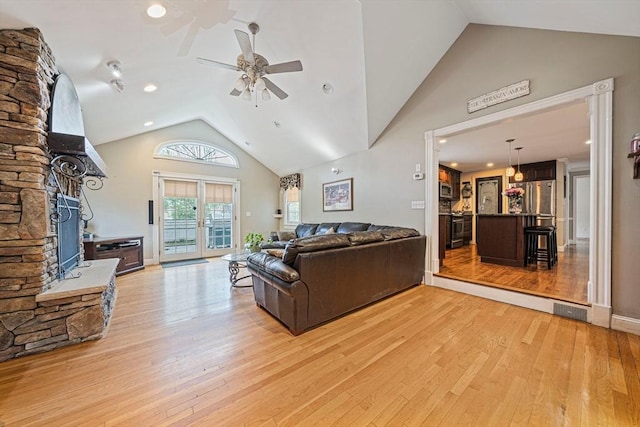 57 Century Rd, Weymouth, MA 02190 - living area with a ceiling fan, light wood finished floors, high vaulted ceiling, and recessed lighting