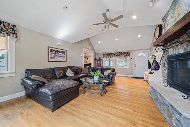 57 Century Rd, Weymouth, MA 02190 - living area featuring a fireplace, vaulted ceiling, baseboards, wood finished floors, and ceiling fan