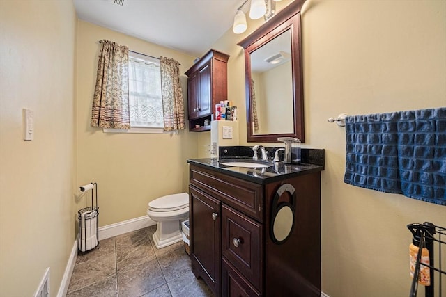 57 Century Rd, Weymouth, MA 02190 - bathroom featuring baseboards, vanity, and toilet