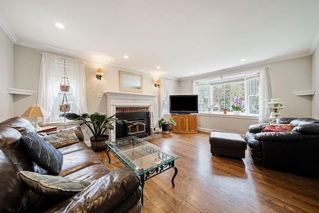 57 Century Rd, Weymouth, MA 02190 - living area featuring wood finished floors, a brick fireplace, crown molding, recessed lighting, and baseboards