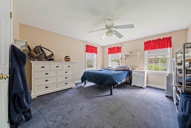 57 Century Rd, Weymouth, MA 02190 - bedroom with dark colored carpet, baseboards, and ceiling fan