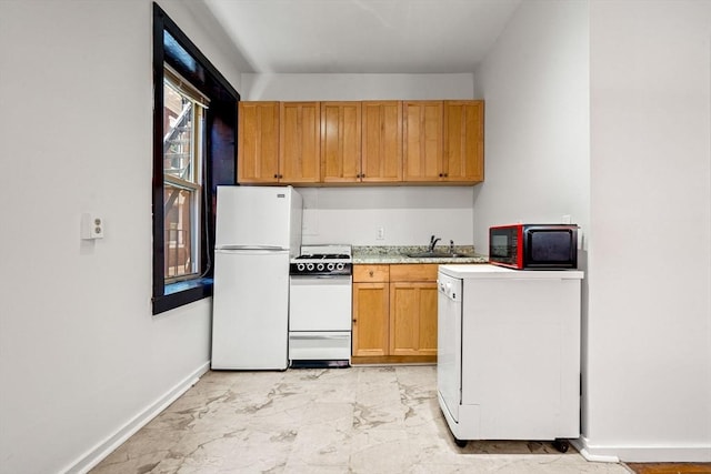 11 Unity St Unit 4, Boston, MA 02113 - kitchen featuring white appliances and light marble finish floors