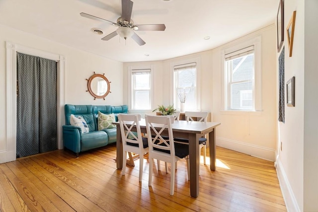 112 School Unit 3, Boston, MA 02119 - dining space with light wood-style floors, plenty of natural light, baseboards, and a ceiling fan