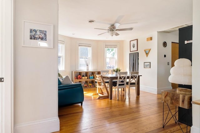 112 School Unit 3, Boston, MA 02119 - dining room with a ceiling fan, light wood-type flooring, and baseboards