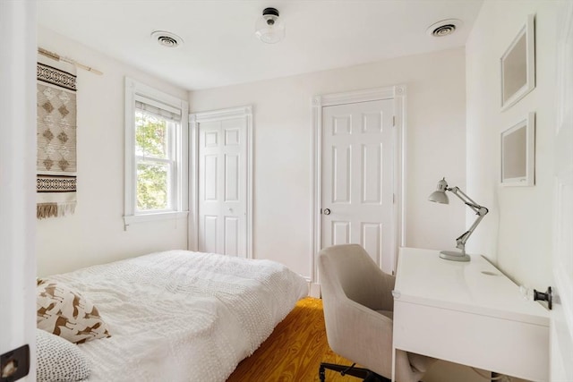 112 School Unit 3, Boston, MA 02119 - bedroom with wood finished floors