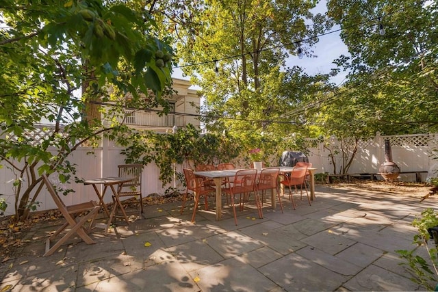 112 School Unit 3, Boston, MA 02119 - fenced backyard with outdoor dining area and a patio area