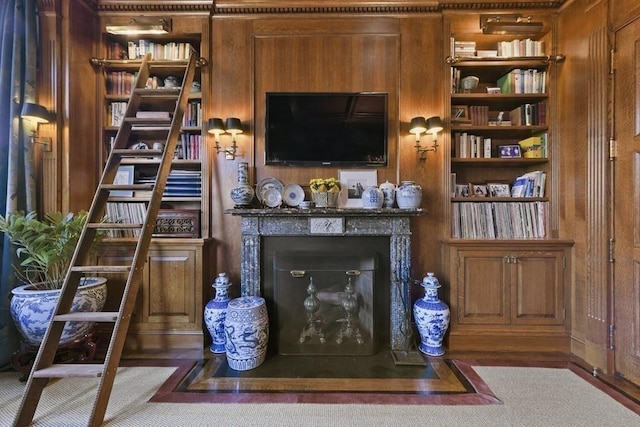 living room featuring a fireplace with flush hearth