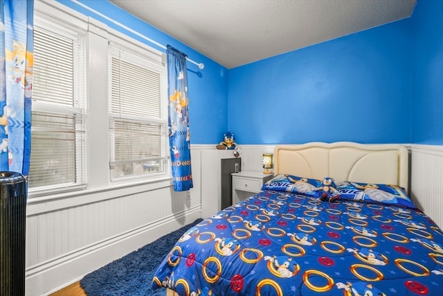 bedroom featuring a textured ceiling