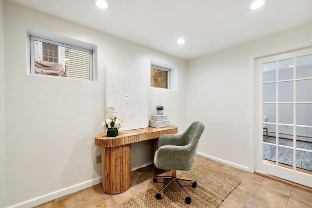 office featuring light tile patterned floors, recessed lighting, a baseboard radiator, and baseboards