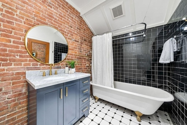 bathroom with shower / tub combo with curtain, lofted ceiling, visible vents, vanity, and brick wall