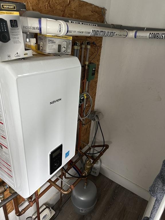 21 Sigel St, Worcester, MA 01610 - utility room with water heater
