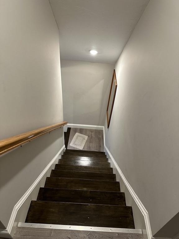 21 Sigel St, Worcester, MA 01610 - stairway with baseboards, wood finished floors, and recessed lighting