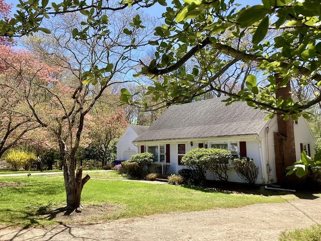68 Briarbrook Dr, Seekonk, MA 02771 - view of front of home with a front lawn, roof with shingles, and a chimney