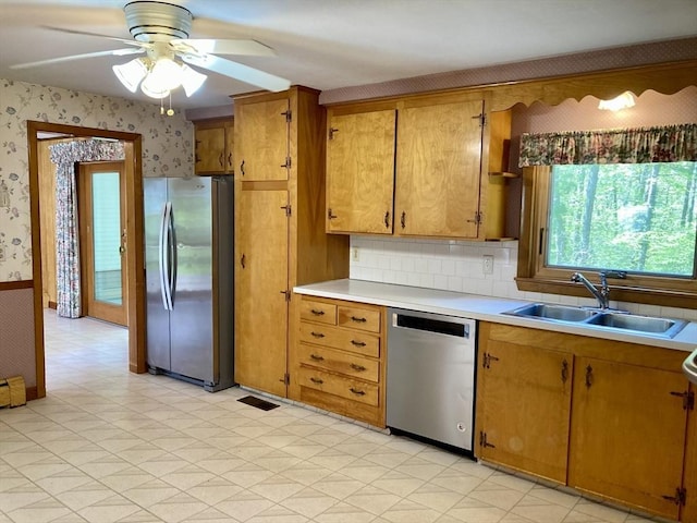 68 Briarbrook Dr, Seekonk, MA 02771 - kitchen featuring stainless steel appliances, wallpapered walls, a sink, light countertops, and ceiling fan