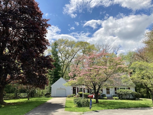 68 Briarbrook Dr, Seekonk, MA 02771 - obstructed view of property featuring driveway, a front lawn, and a garage